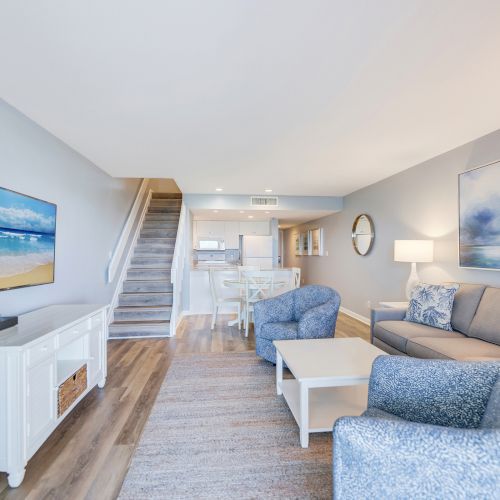 Living room with stairs and seating area