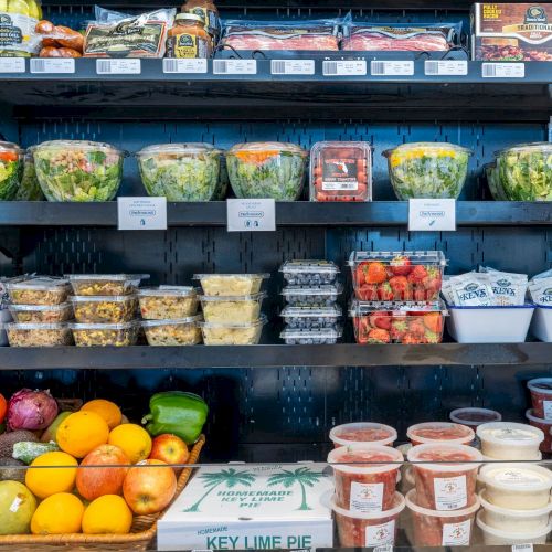 Fresh produce and pre made salads on market shelves