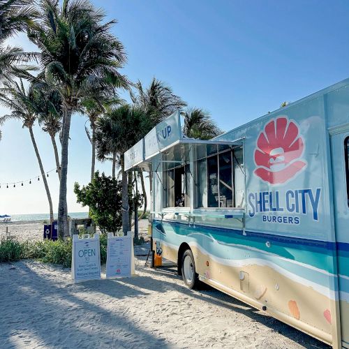 Shell City Burgers food truck set up near the beach