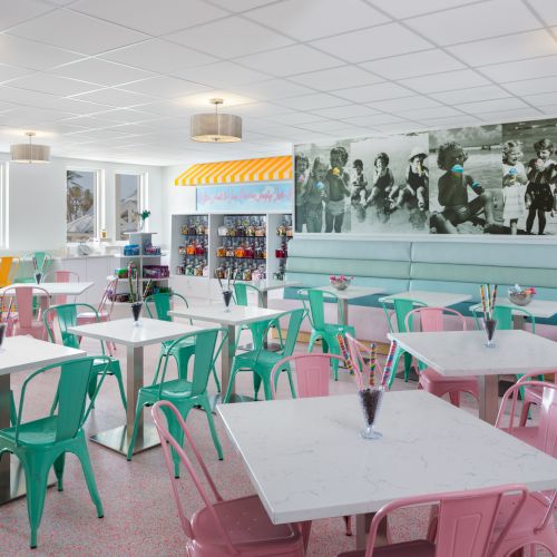 Casual dining area with colorful seating at South Seas