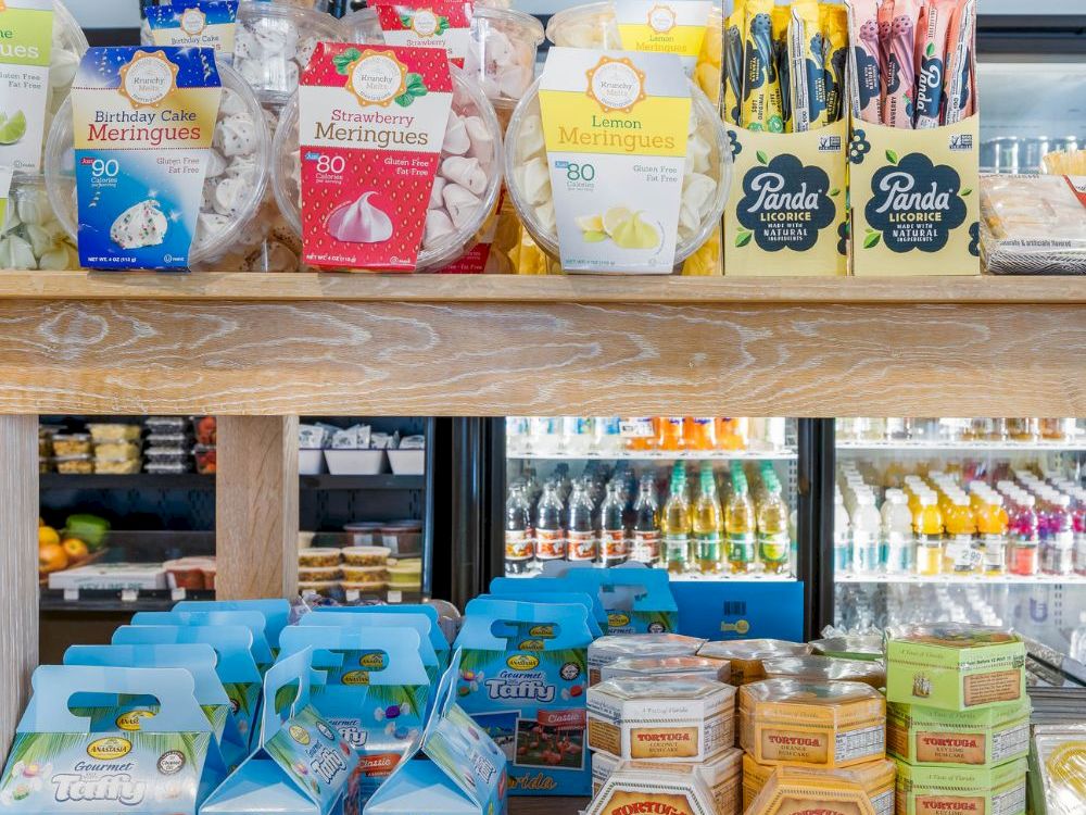 Assorted snacks and local products in a market display