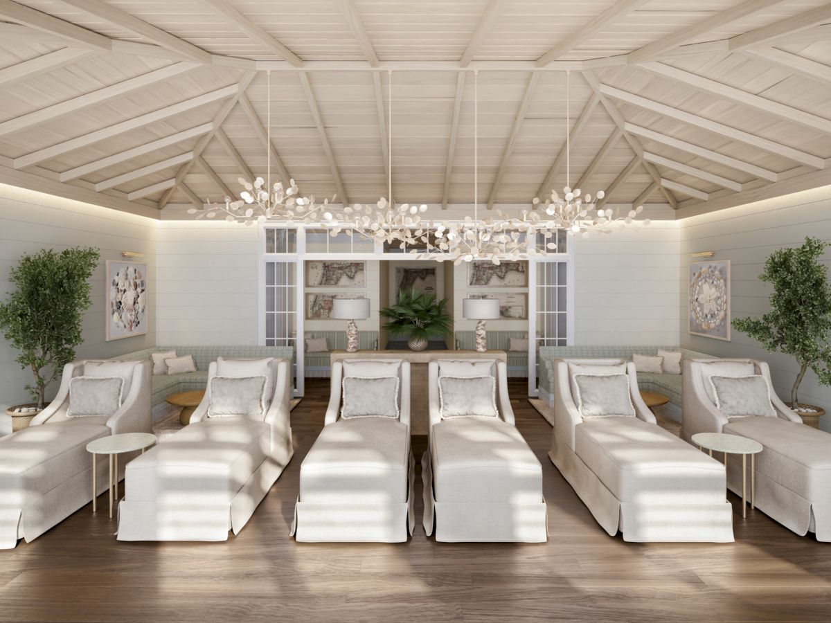 Spa relaxation lounge with white chairs at South Seas