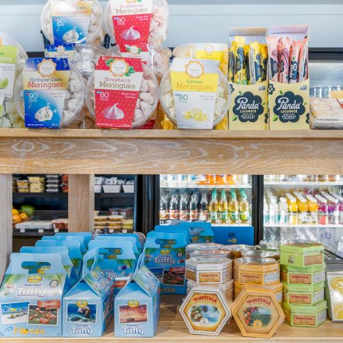 Assorted snacks and local products in a market display