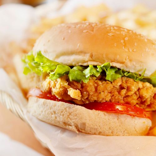 Crispy chicken sandwich with lettuce and tomato