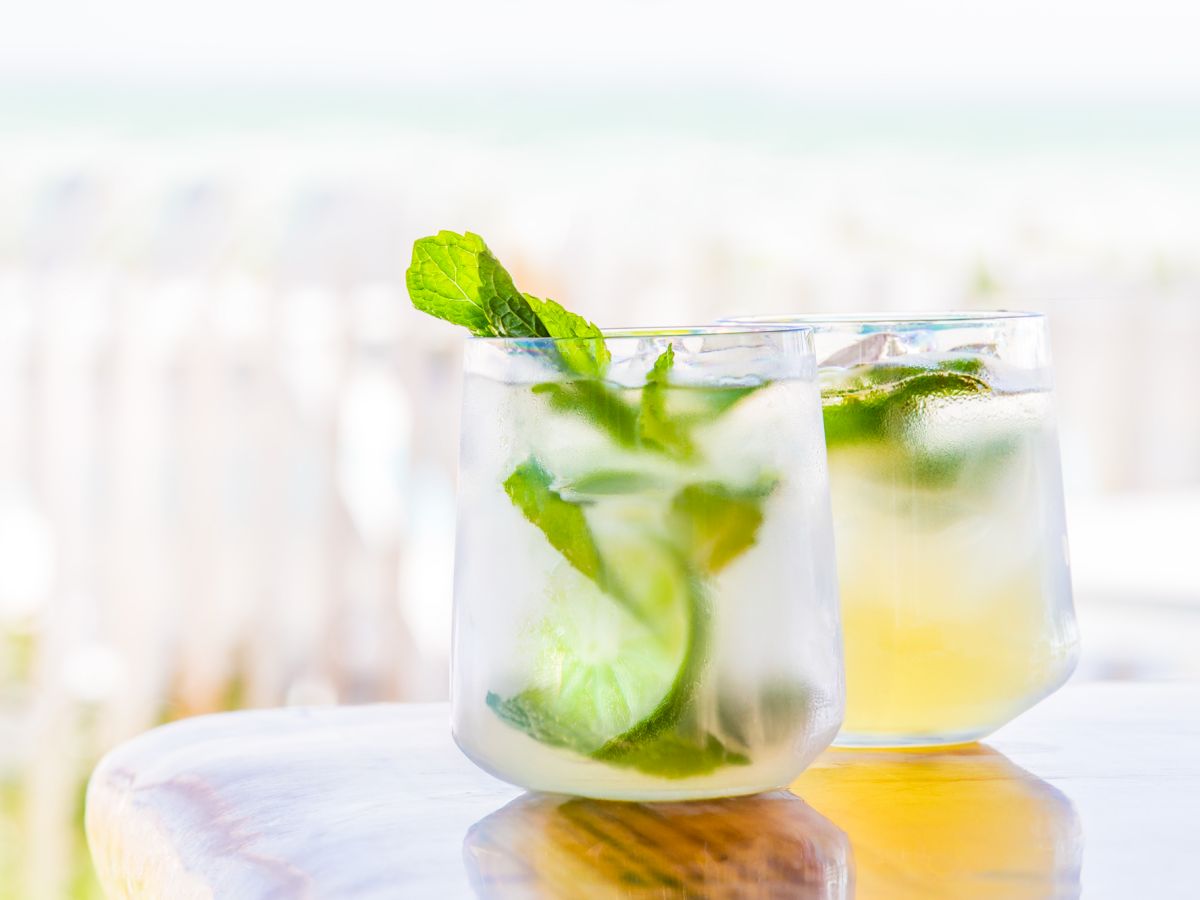 Refreshing cocktail with mint and lime by the beach
