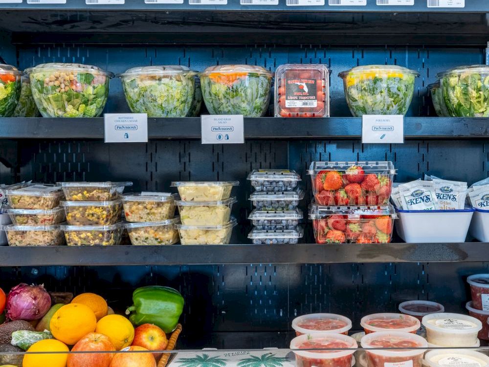 Fresh produce and pre made salads on market shelves