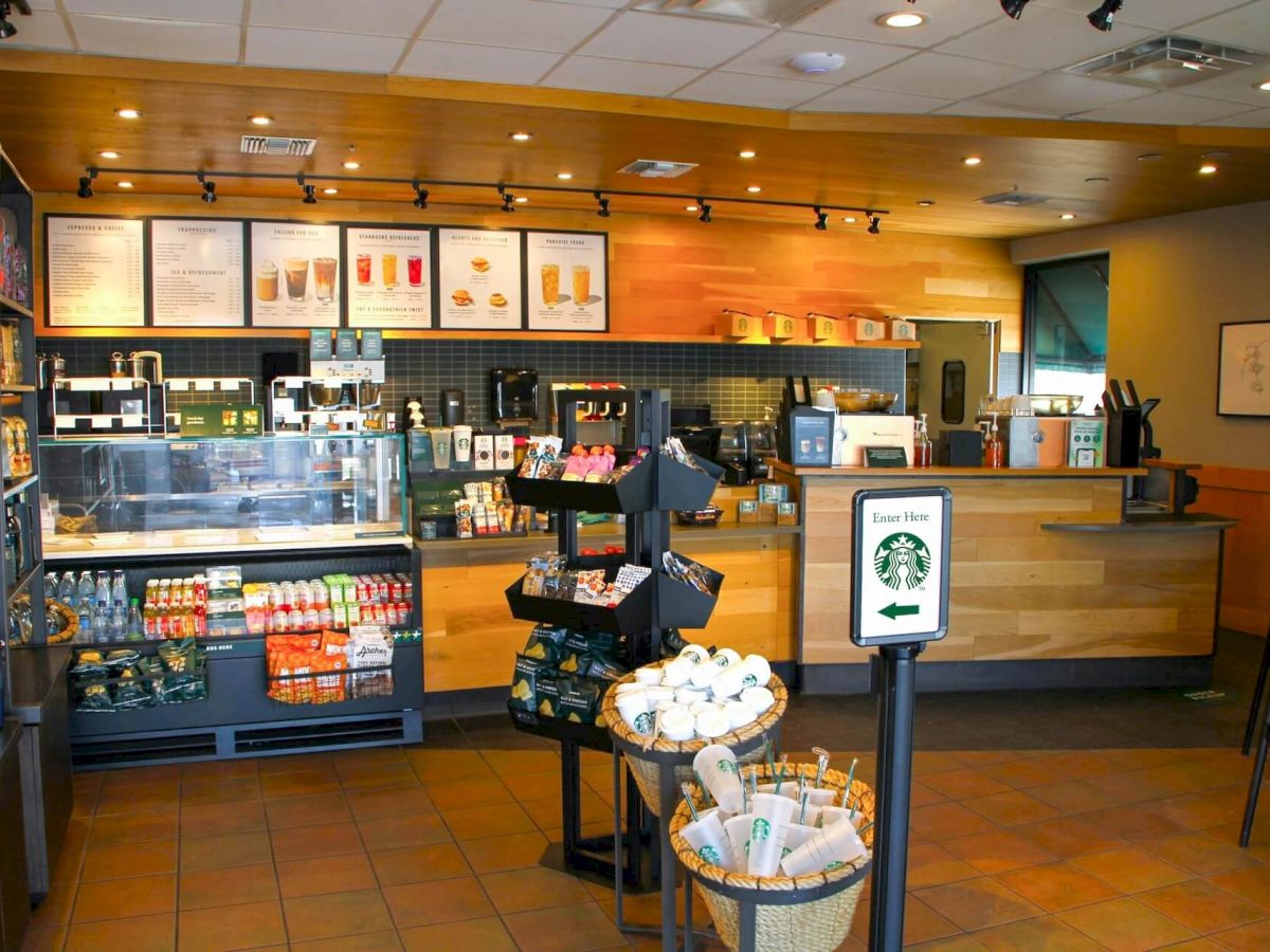 Starbucks counter and seating area with menu boards