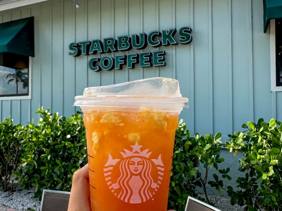Iced tea held up outside a Starbucks location