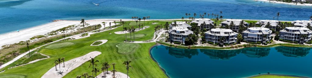 Aerial view of golf course by the ocean