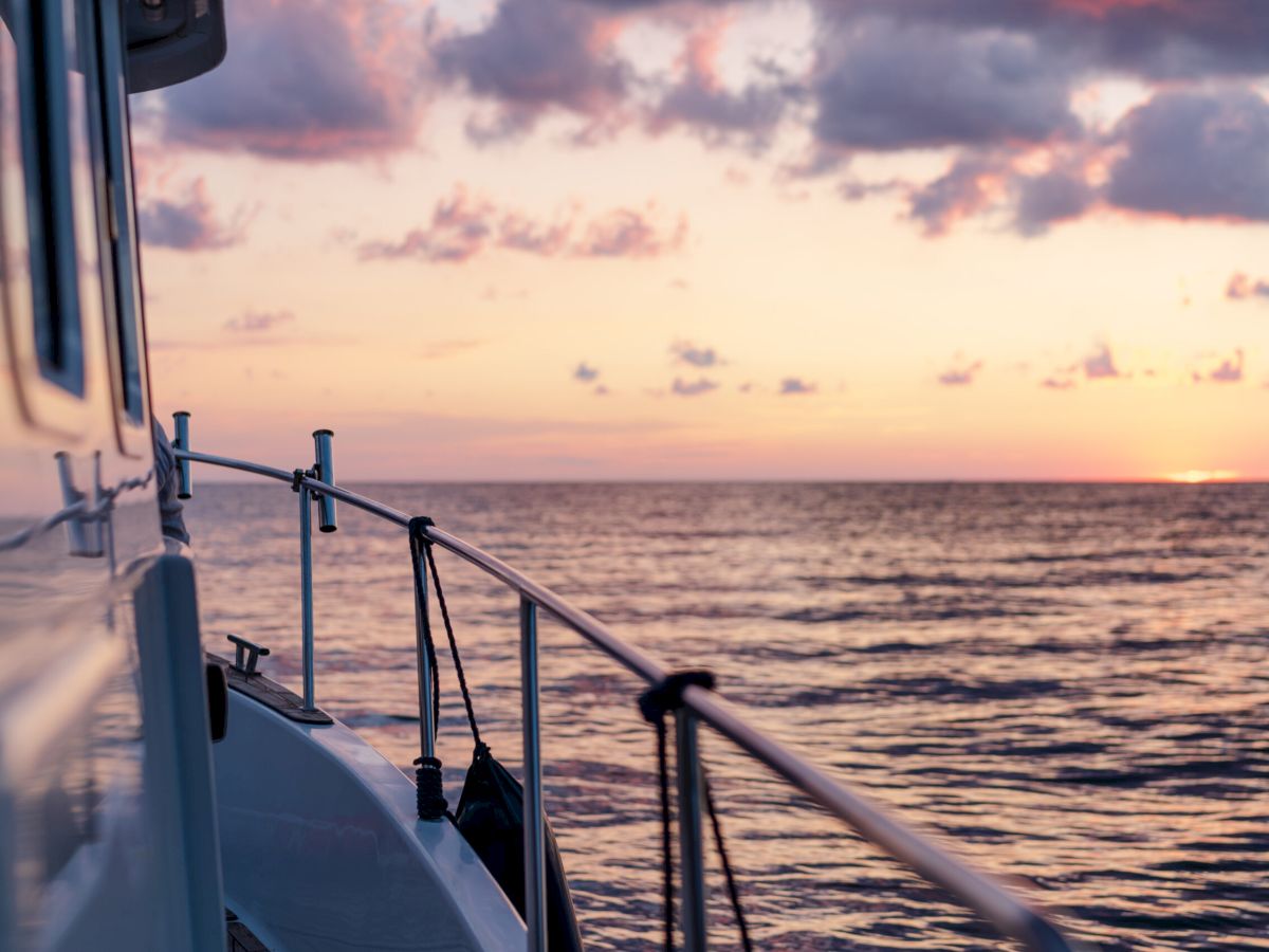 View from a boat deck at sunset