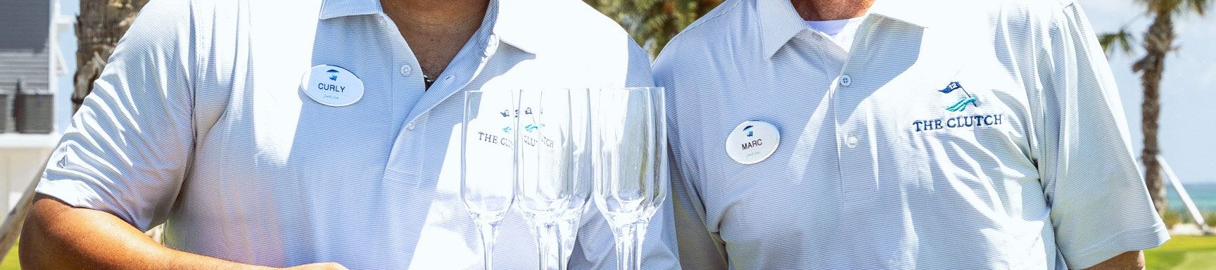 Two team members preparing to serve champaign on the golf course