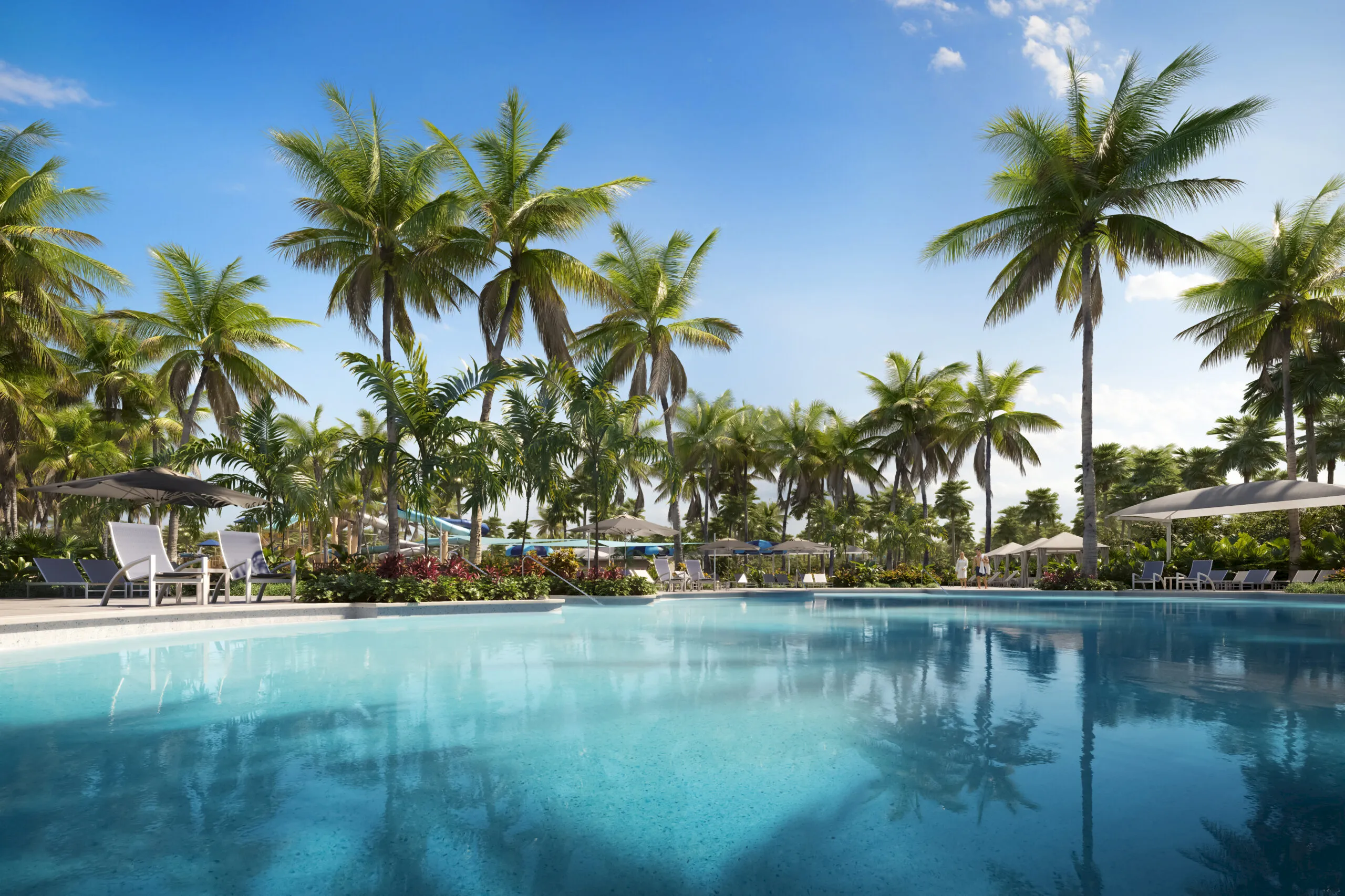 Palm trees reflecting in a resort pool at South Seas