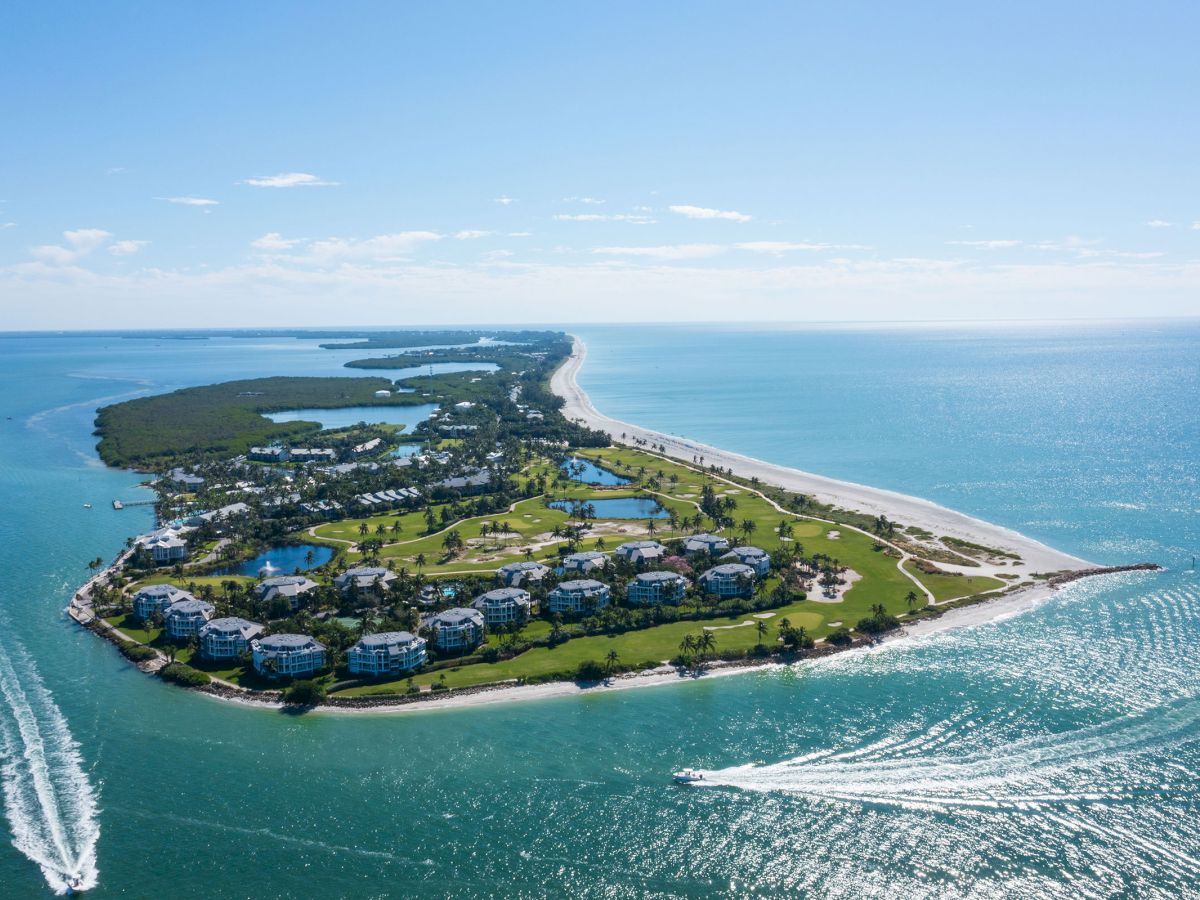 Aerial view of a peaceful island surrounded by clear blue water