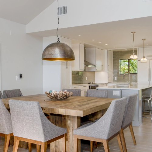 Dining table next to kitchen