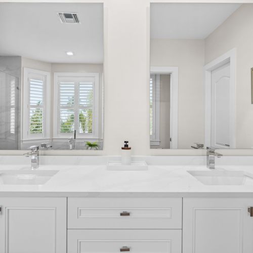 Bathroom with tub and glass shower