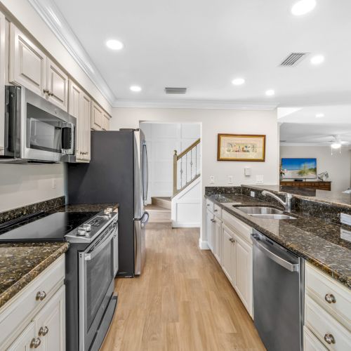 Kitchen with granite countertops and stainless steel appliances