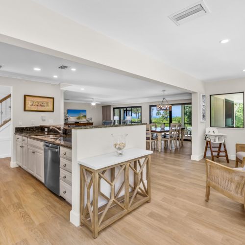 Kitchen and dining area with wood floors and natural light
