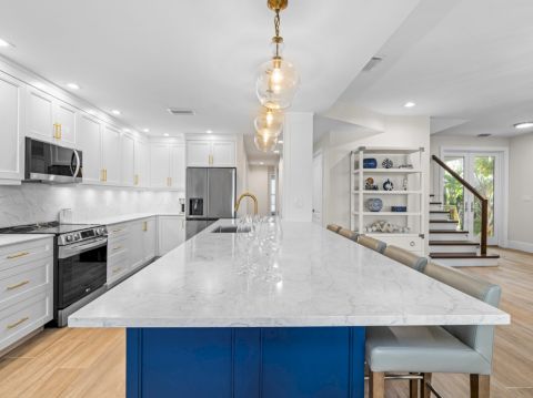 Bright kitchen with large white island