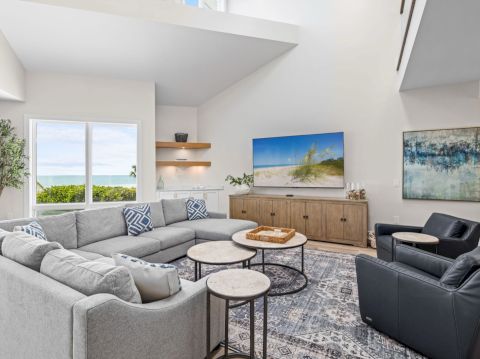 Cozy living area with TV and patterned rug