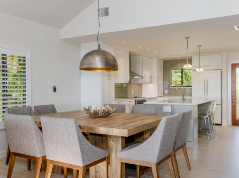Dining table next to kitchen