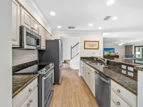 Kitchen with granite countertops and stainless steel appliances